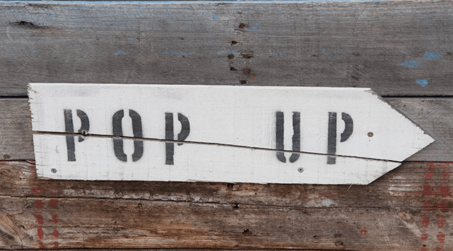 Portable pop up shop container sign