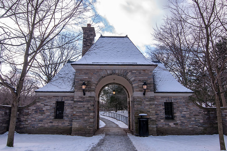 A gatehouse is covered in snow in Pittsburgh’s Point Breeze neighborhood