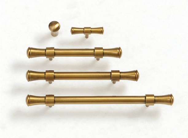 A set of new cabinet hardware pieces for a primary bathroom remodel.