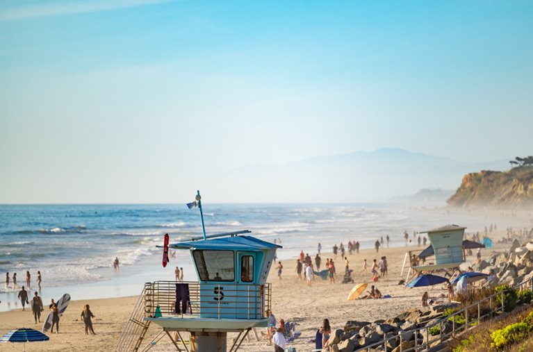 Locals enjoy a sunny day at Torrey Pines State Natural Reserve Beach in San Diego County. 