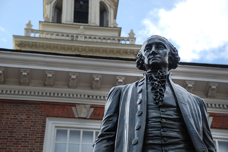  A shot of the bronze George Washington statue in front of Independence Hall in Philadelphia.