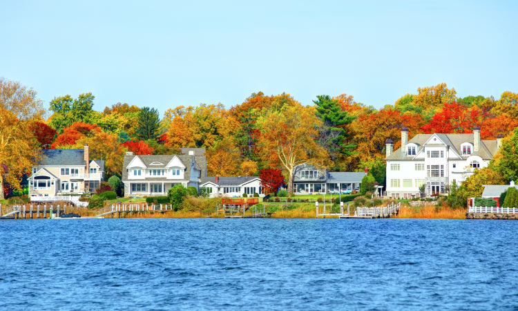 A scenic view of Red Bank, New Jersey's waterfront homes during the vibrant fall season.