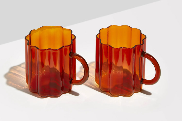 A pair of orange Wave Mugs from Fazeek. 