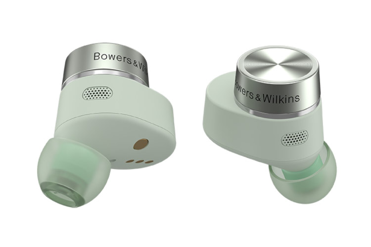 A pair of Bowers & Wilkins earbuds is set against a white background.
