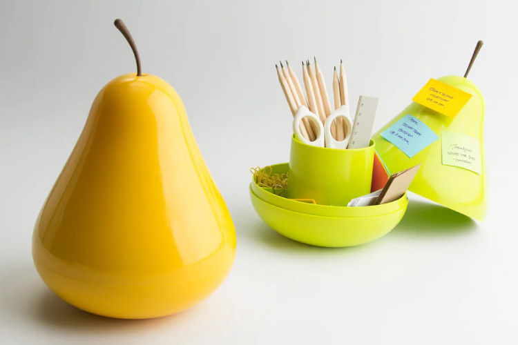 Two Pear Pod Multifunctional Desktop Organizers, one yellow and one green. The yellow one is closed up and the green one is open, exposing all of the desktop tools that it stores. 