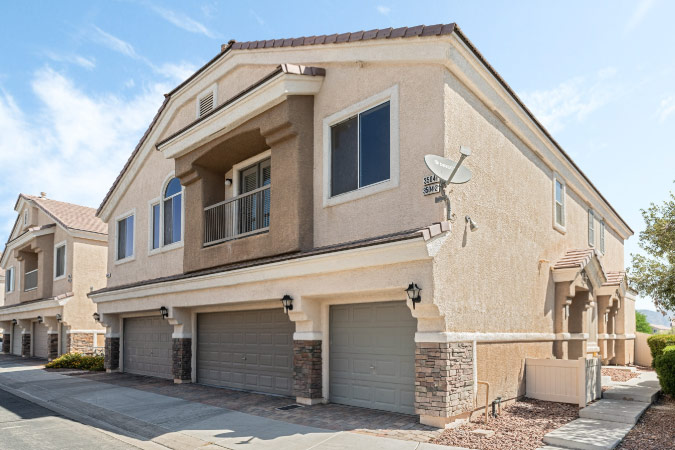 An exterior view of a couple of large townhome buildings in Aliante, one of the best Las Vegas suburbs