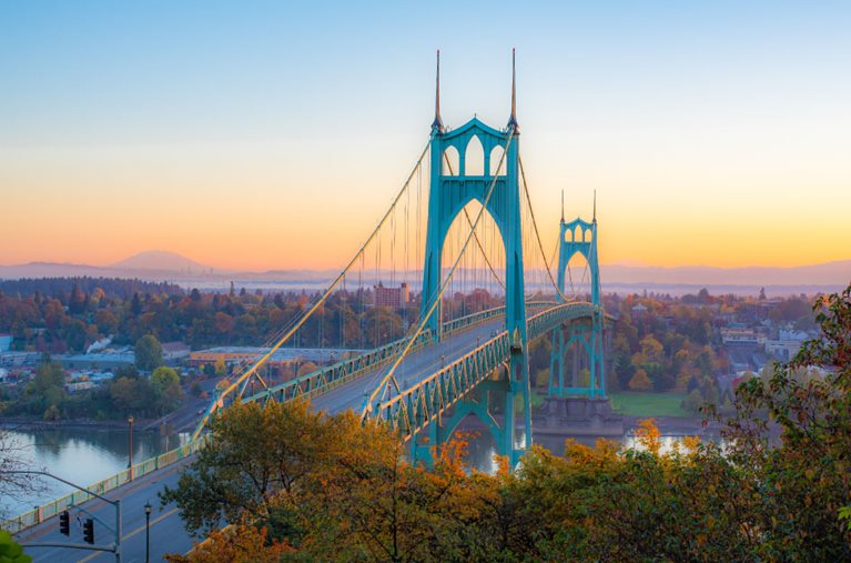 Sunset view of the St. Johns Bridge on the route between Portland and Camas, Washington — one of the best Portland suburbs.