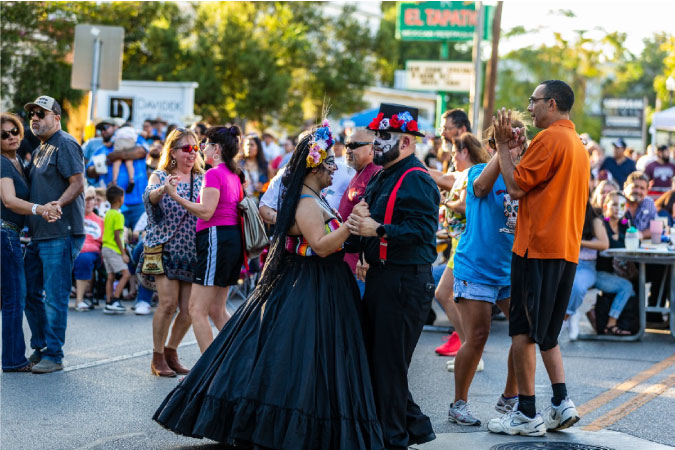 Locals gather for the Annual Dia de los Muertos Festival, held every October in Downtown New Braunfels. 