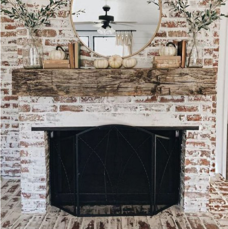 People with fireplace decor ideas galore will love a farmhouse fireplace, as you can easily deck out the mantel with decorations.