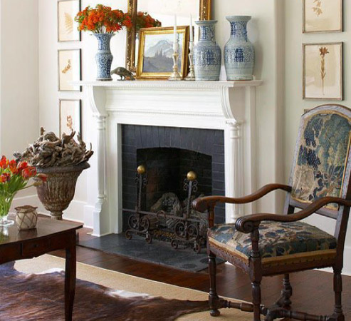 Traditional fireplaces are a natural fit for a formal living room, but they’re versatile — try mixing a traditional hearth with modern decor.