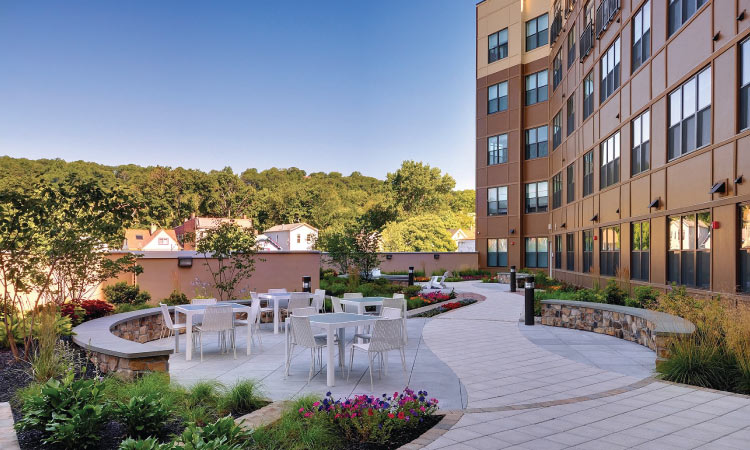 An outdoor seating area at the Valley & Bloom apartment community in Montclair, New Jersey. 