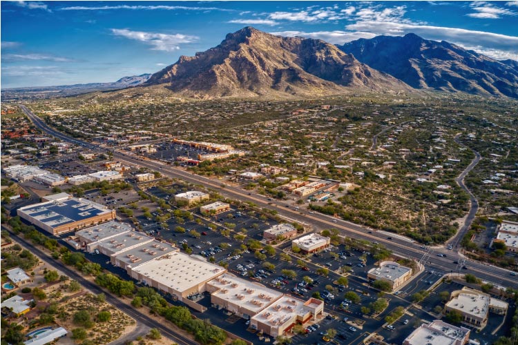 Aerial view of Oro Valley, a suburb of Tucson, Arizona. The city fills a flat valley at the foot of Mt. Kimball.