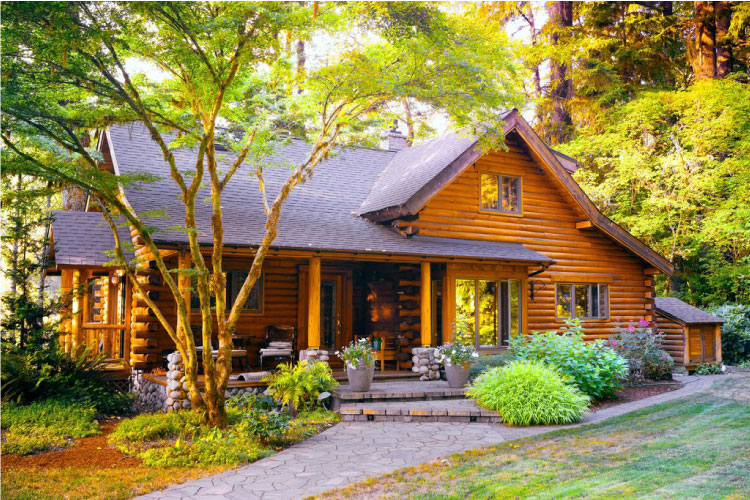 A log cabin in Grosse Pointe Farms, Michigan. The home features vibrantly-colored log construction and natural landscaping.
