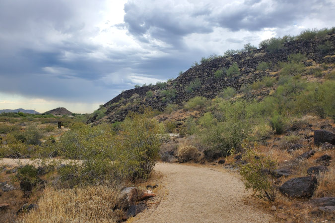 The view along a dirt trail in the Deer Valley Petroglyph Preserve in Deer Valley, Phoenix, AZ