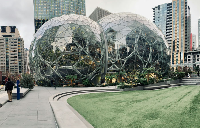 Seattle pros and cons include both the con of a high cost of living and the pro of a culturally rich city, home to impressive spots like The Spheres on 7th Avenue (pictured here).