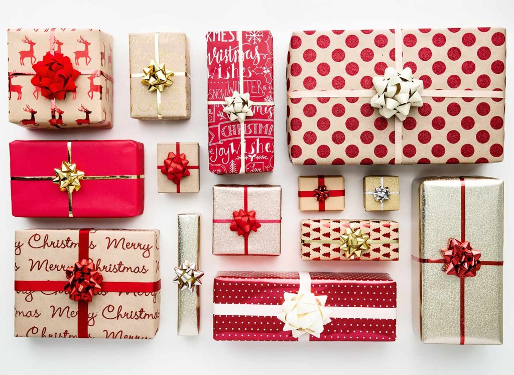 An aerial view of various wrapped holiday gifts 