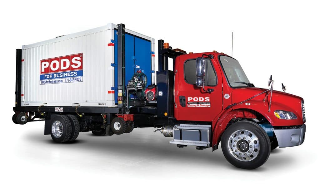 PODS delivery truck carrying a storage container